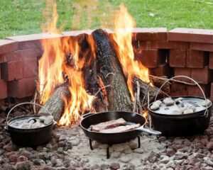 Lodge 12-inch pre-seasoned cast iron skillet with red silicone handle holder — Lodge skillet deals